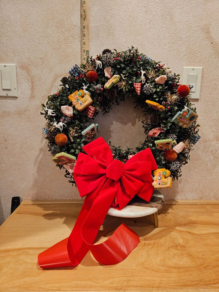 Decorative Holiday Wreath with Red Bow