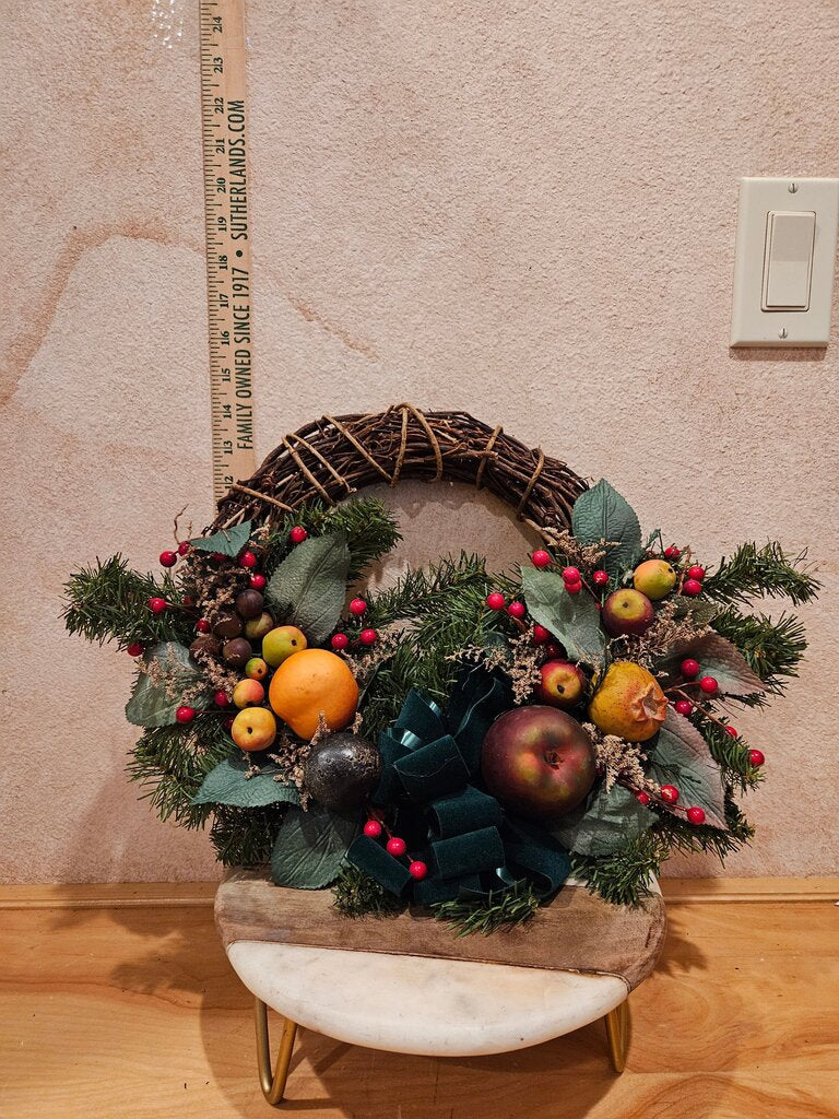 Decorative Holiday Wreath with Fruits and Ribbon