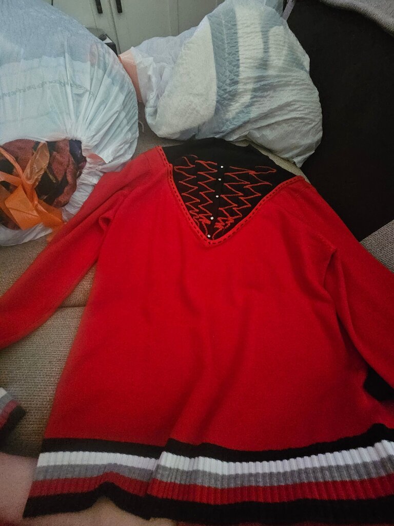Red and Black Knit Sweater with Decorative Neckline