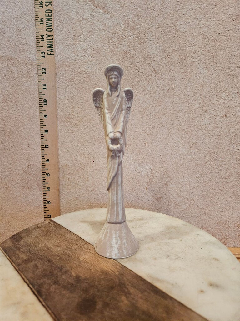 Angel Figurine Holding Child