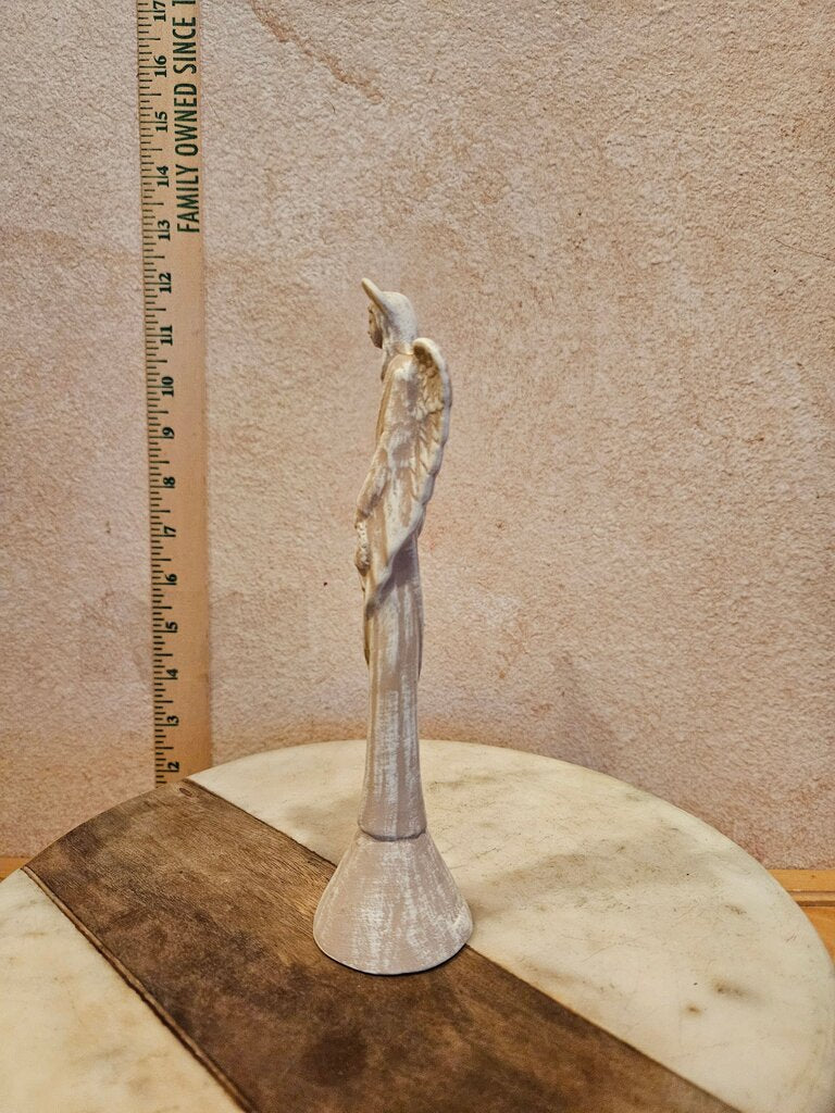 Angel Figurine Holding Child