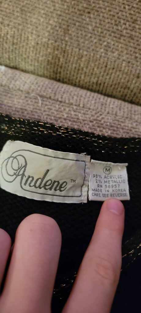 Andene Women's Black Sweater with Metallic Threads