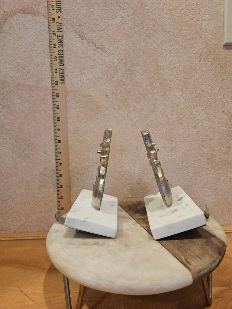 Two Silver Colored Snowmen On White Marble Bases Stocking Hangers mantel Holiday Christmas Decor